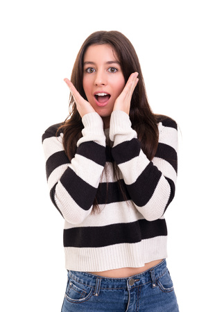 Surprised young woman isolated over white backgroundの写真素材