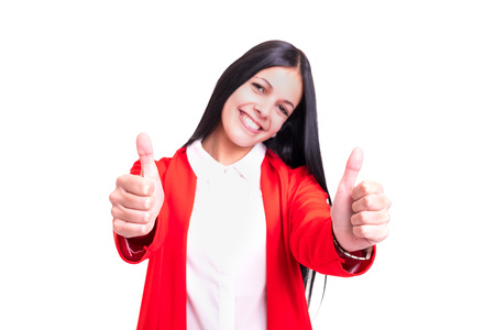 Beautiful young woman signaling ok, isolated over whiteの写真素材