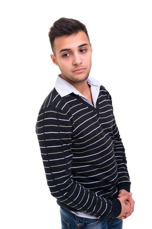 Studio picture of a young and handsome man posing isolatedの写真素材