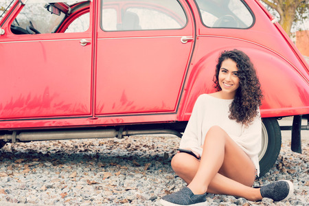 Woman going on a roadtrip in her convertible carの写真素材