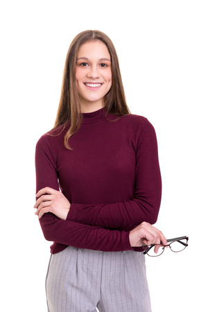 Beautiful young business woman posing isolated over white backgroundの写真素材