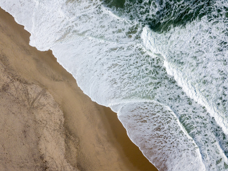 Drone view of the beautiful Portuguese beach of Costa Nova do Prado - Aveiroの写真素材