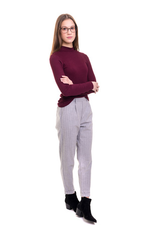 Beautiful young business woman posing isolated over white backgroundの写真素材