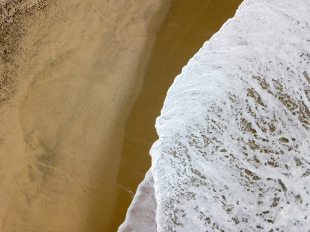 Drone view of the beautiful Portuguese beach of Costa Nova do Prado - Aveiroの写真素材