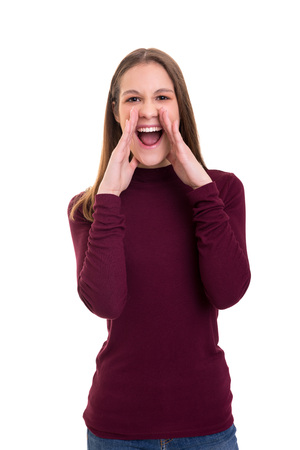 Woman screaming at someone, isolated over a white backgroundの写真素材
