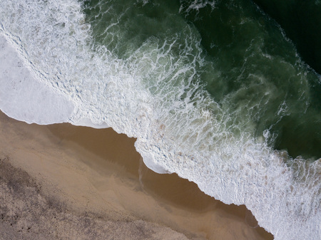 Drone view of the beautiful Portuguese beach of Costa Nova do Prado - Aveiroの写真素材