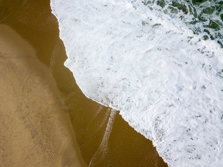 Drone view of the beautiful Portuguese beach of Costa Nova do Prado - Aveiroの写真素材