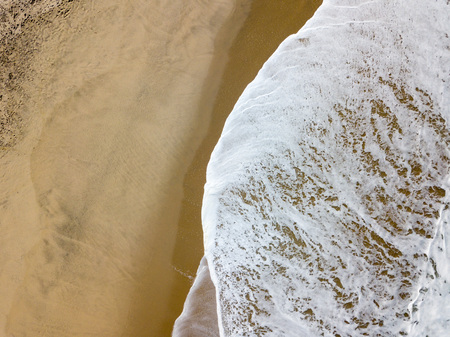 Drone view of the beautiful Portuguese beach of Costa Nova do Prado - Aveiroの写真素材