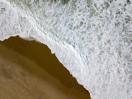 Drone view of the beautiful Portuguese beach of Costa Nova do Prado - Aveiroの写真素材