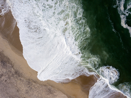 Drone view of the beautiful Portuguese beach of Costa Nova do Prado - Aveiroの写真素材