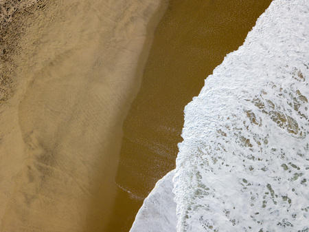 Drone view of the beautiful Portuguese beach of Costa Nova do Prado - Aveiroの写真素材