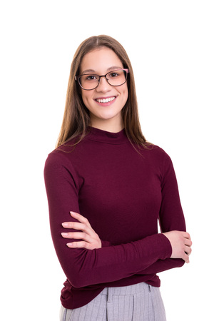 Beautiful young business woman posing isolated over white backgroundの写真素材