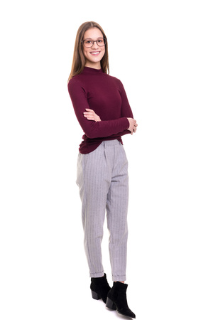 Beautiful young business woman posing isolated over white backgroundの写真素材
