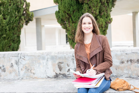 Happy young student at the university campusの写真素材
