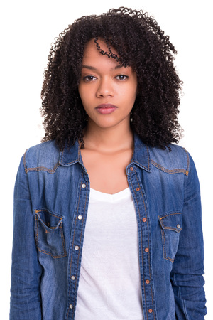 Beautiful young african woman posing isolated over whiteの写真素材
