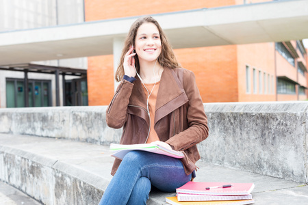 Happy young student at the university campusの写真素材