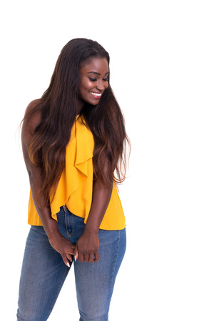 Beautiful young african woman posing isolated over whiteの写真素材
