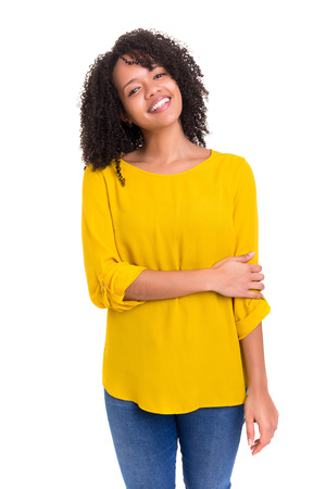 Beautiful young african woman posing isolated over whiteの写真素材