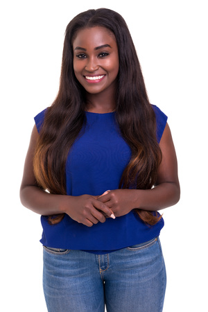 Beautiful young african woman posing isolated over whiteの写真素材