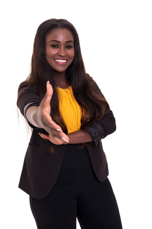 A beautiful african business woman offering handshake, isolated over whiteの写真素材