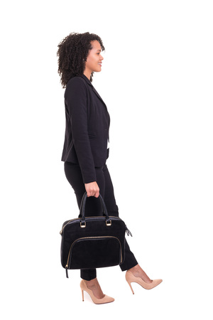 Beautiful african business woman posing isolated over white backgroundの写真素材