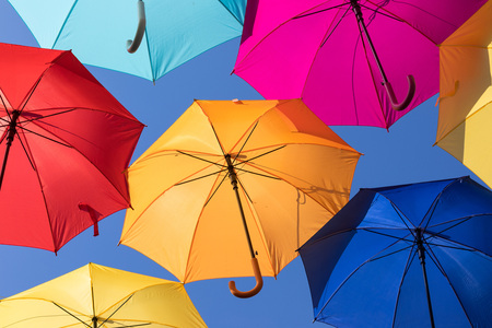 Lots of umbrellas coloring the sky in the city of Agueda, Portugalの写真素材