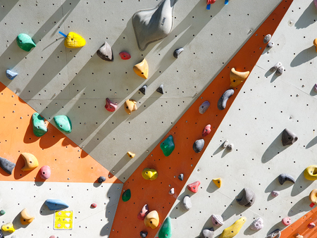Indoor and outdoor sports climbing stone wall.の写真素材