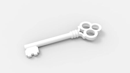 3d rendering of a key isolated in a colored studio backgroundの写真素材