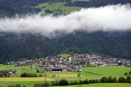 Austria europe mountain landscape with village and natural scene grass lands.の写真素材