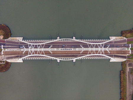 Aerial drone video of the Enneus Heermabrug in Amsterdam, The Netherlands going to Ijburg and...