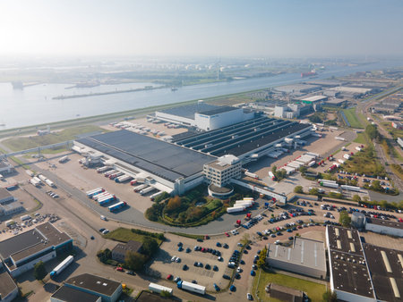 Zaandam, 9th of October 2021, The Netherlands. Albert Heijn distribution center aerial view of trucks loading and unloading at a sunny day.のeditorial素材