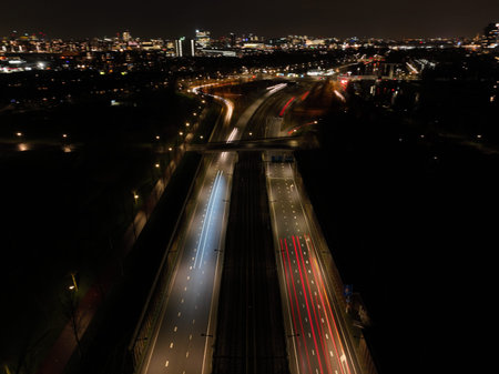 Amsterdam at night, dutch infrastructure road intersection, train, road,track, metro and...