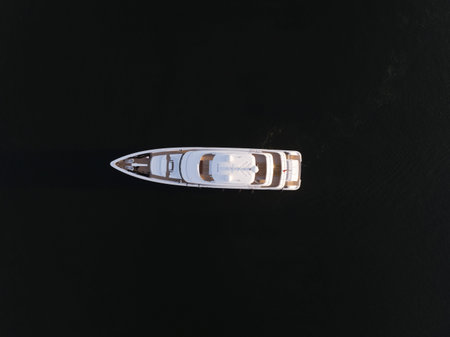 Luxury leisure motor yacht marine cruise sea ship overhead top down aerial drone view. Motorized recreational mega transport vessel boat.の写真素材