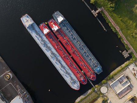 Petrochemical energy heavy transport industry cargo vessel tankers top down aerial drone view....