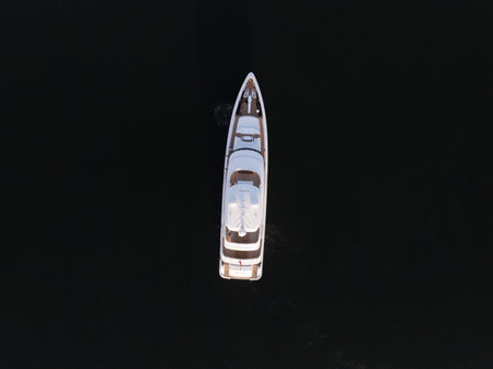 Amsterdam Oostenburg, 17th of June 2022, The Netherlands. Luxury leisure motor yacht marine cruise sea ship overhead top down aerial drone view. Motorized recreational mega transport vessel boat.のeditorial素材