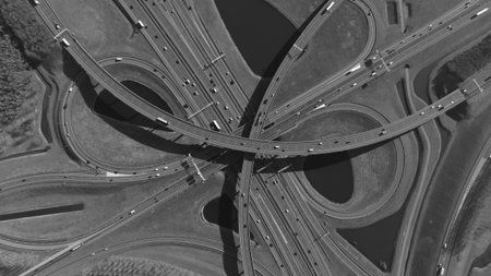 multi level traffic intersection highway, clover leaf, multil lane. Mobility and transport, to pdown photo. Aerial photo.の写真素材