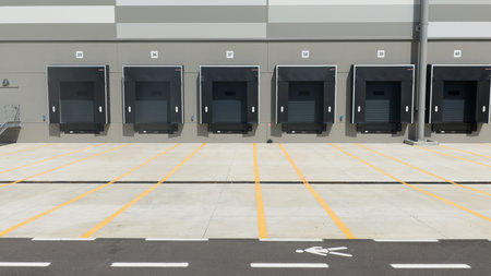 Truck dock platform logistics warehouse empty space door for loading and unloading goods.