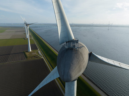 Wind energy generating power on water by farmland