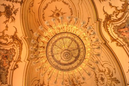 up view of ballroom naroque ceiling chandelierの写真素材