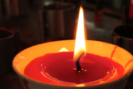 Light from the candle in the bowlの写真素材