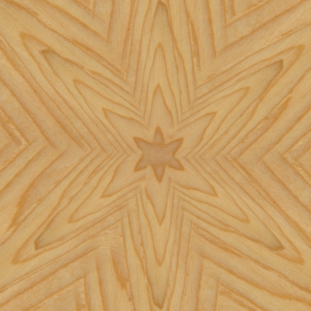 Flower shape texture on light brown woodの写真素材