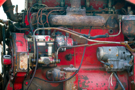 Red old rust tractor engineのeditorial素材