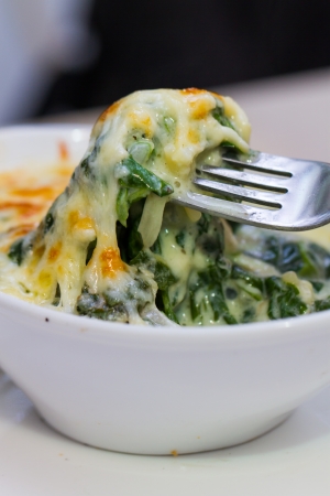dip up shot for baked spinach with cheeseの写真素材