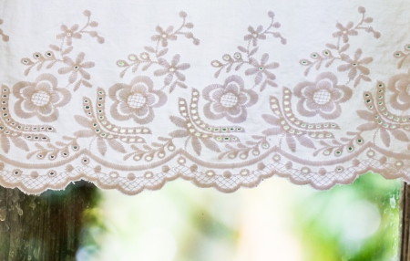 white handicraft with flower pattern curtainの写真素材