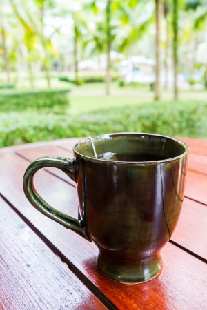 cup of tea on table in the gardenの写真素材