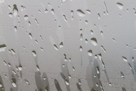 rain drop and steam on windowの写真素材