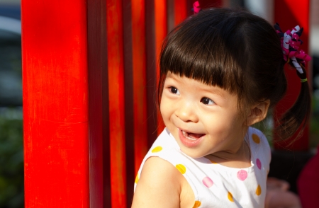 little girl with big smileの写真素材