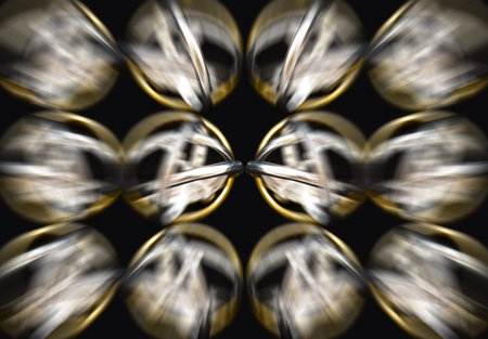 pure gold rings on black backgroundの写真素材