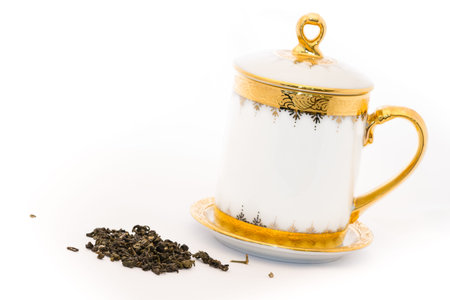 thai style tea mug with golden colorの写真素材