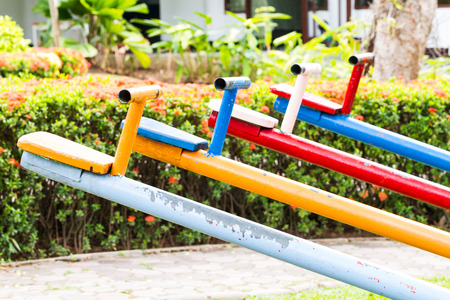 side of colorful seesaw at playgroundの写真素材